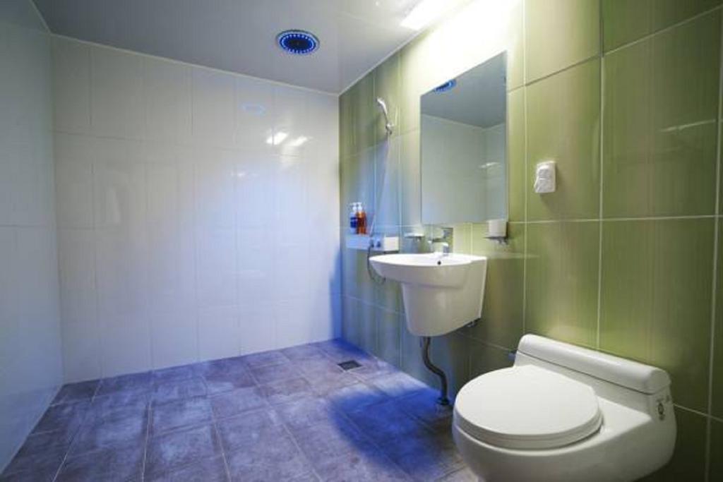Seongsan Aqua Beach Hotel Seogwipo Room photo